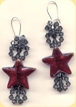 creazioni di orecchini con cristalli Swarovski ematite e perle ciondoli in vetro color rubino
