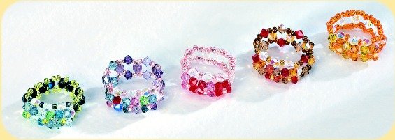 creazioni anelli Swarovski cristalli verdi sfumature lilla viola rossi rosa arancioni