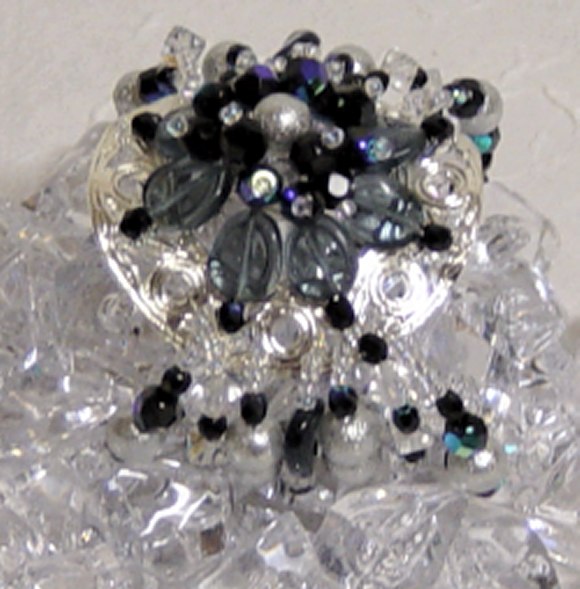 braccialetto filigrana argento perle nere cristalli iridati perline elica