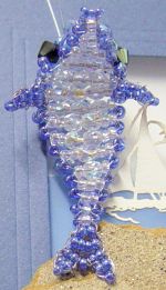 delfino perline fai da te con materiale occorrente da comprare per creare ciondolo collana catena portachiavi bracciale