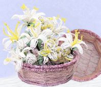 composizione orchidea giglio fiori perline per bomboniere Cresima