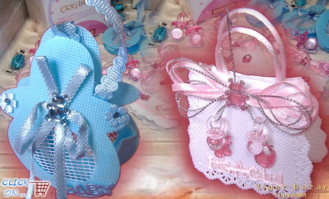 ricordini bomboniere celeste rosa bavaglino e borsetta portaconfetti decorazioni baby