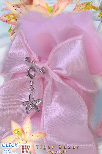 esempio Battesimi, nascite e Comunioni bambine confetti sacchettini fiocco rosa con bijoux economici