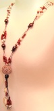 collana etnica pietre intagliate perle di legno filo cerato sottile