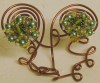 orecchini modello fiori di perline verdi