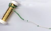infilare perline sul rocchetto filo 0,30 per intreccio tessitura