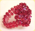 Rico anello perline cristalli rombetti bicono rosso rubino
