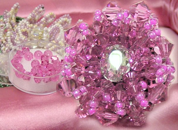 ninfea bomboniere perline matrimonio, idea anello strass e Swarovski rosa fucsia